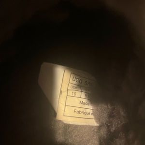 Size 10 women’s Ugg house shoes black